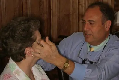 Doctor treating a patient for TMJ